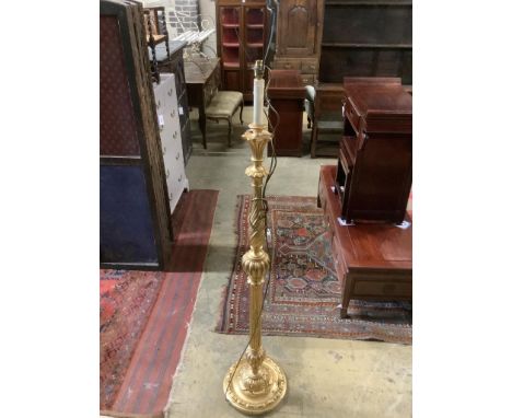   A carved giltwood lamp standard, height 157cm