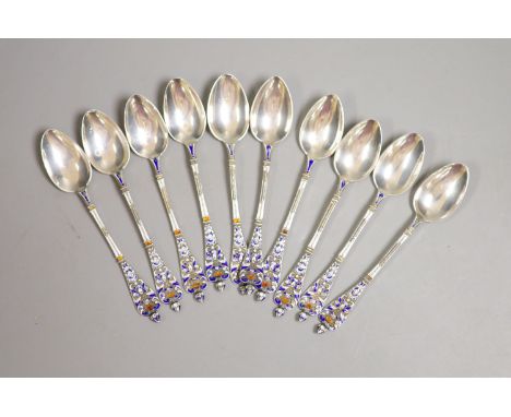   A set of ten continental 800 standard white metal and enamel coffee spoons(a.f.),11.2cm, gross weight 136 grams.