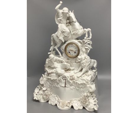   A 19th century German porcelain mantel clock modelled as a lion hunt, height 63cm