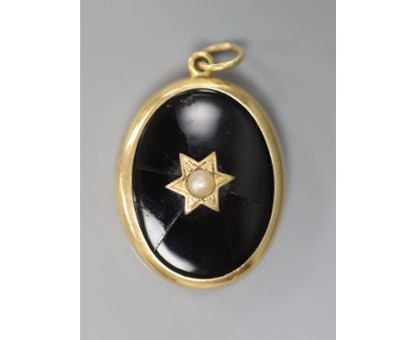   A Victorian Dublin oval yellow metal black enamel and split pearl set locket (Irish by family repute) (a.f.), 33mm, gross 1