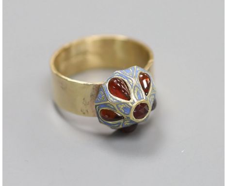   A modern 9ct gold, six stone garnet and enamel set domed top 'button' dress ring (adapted),size N/O, gross 5.6 grams.