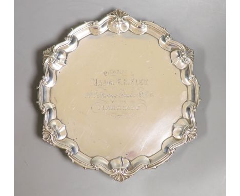   An Edwardian silver salver by William Hutton and Sons, London, 1908, with presentation inscription to major E.H Eley, by th