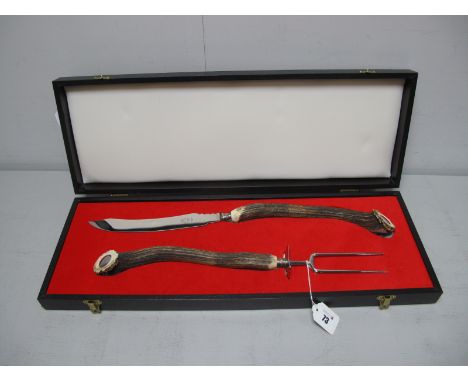 A Large Horn Handled Meat Carving Knife and Fork, (knife overall length 52.5cm), in original fitted case. 