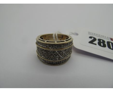 A Wide 9ct Gold Dress Ring, pave set (finger size K) (7grams). 