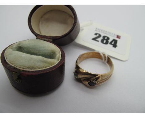 A 9ct Gold Double Serpent Ring, with inset highlights (finger size R) (2.2grams); contained in a vintage ring box. 