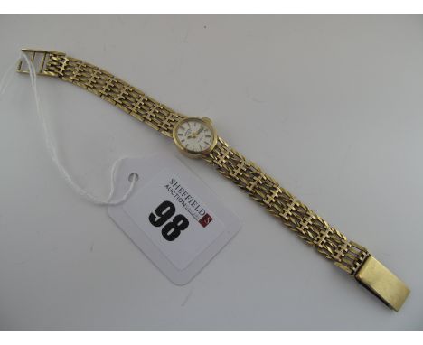 Rotary; A 9ct Gold Cased Ladies Wristwatch, the signed oval dial with line markers, within plain case to integral bracelet (o