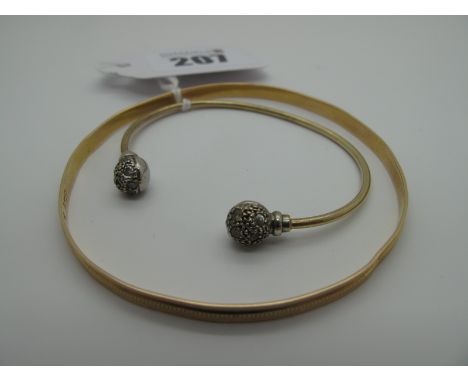 A Child's Torque Style Bangle, with inset highlights (stamped "375") (6.8grams); Together with A High Carat Bangle, (stamped 