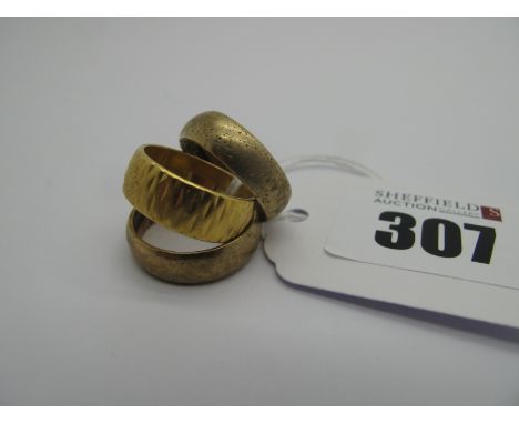 A 22ct Gold Patterned Wedding Band, (finger size K), (5.5grams), a 9ct gold plain wedding band, (finger size M), (3grams) and