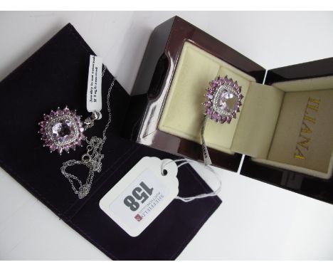 A Modern Large Shopping Channel Cluster Dress Ring, stamped "925" (finger size R); together with matching pendant on chain. 