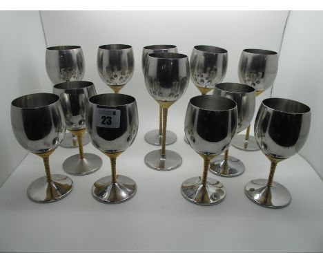 Stuart Devlin for Viners; Two Sets of Six Stainless Goblets, with gilt textured stems. (12)