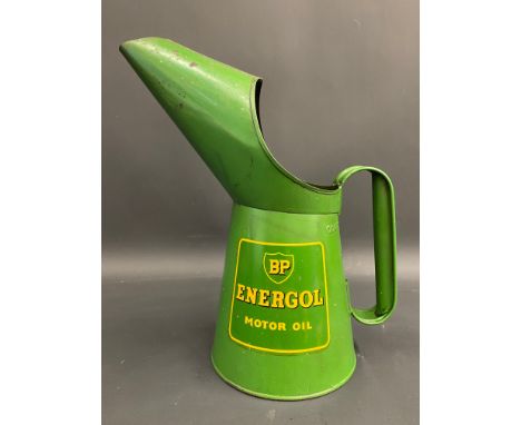 A BP Energol Motor Oil quart measure in excellent condition.