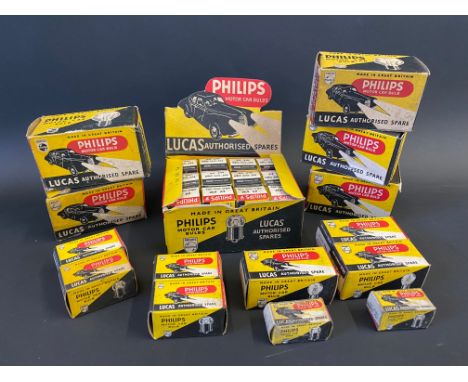 A selection of Philips light bulbs in original packaging including a counter top dispensing box.
