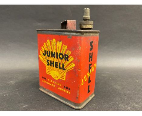 A Junior Shell lighter fluid tin.