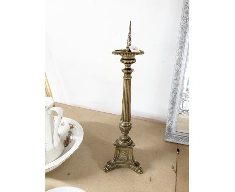 Tall brass freestanding candlestick holder