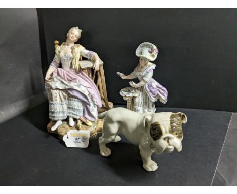 Ceramic bulldog ornament, two continental figural ornaments with crossed swords mark to bases, tallest 20 cm 