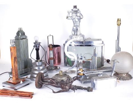 A MID 20TH CENTURY EMPIRE STATE BUILDING LAMP BASE  (QTY)another formed as Atlas and further lamp bases and fittings, The tal