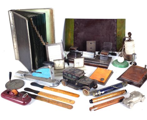 A GROUP OF MID 20TH CENTURY DESK ITEMSincluding, inkwells, notepad holders, stapler and sundry.