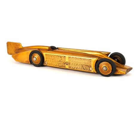 A RARE BAKELITE ‘GOLDEN ARROW’ CLOCKWORK TOY CAR, BY A.G LTDPatent 1929, 44cm longFront left tyre is slightly loose, some los