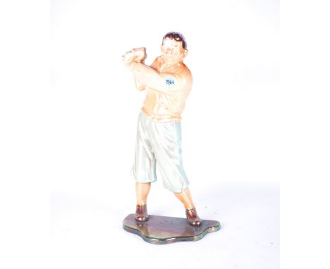 A MID 20TH CENTURY FIRE TOOL STAND FORMED AS A GOLFER55cm high