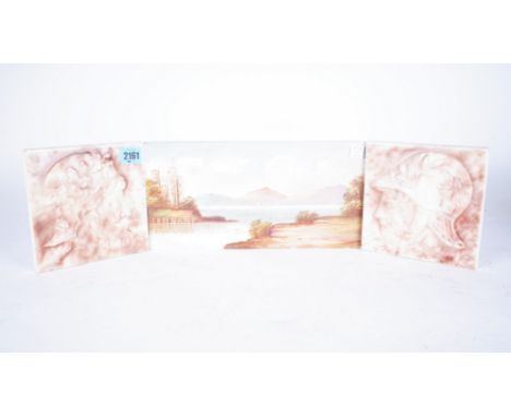 A PAIR OF MOTTLED GLAZE SQUARE TILES EACH DESIGNED WITH A CLASSICAL HEAD  (3)16cm; 16cm and a rectangular painted tile of a c