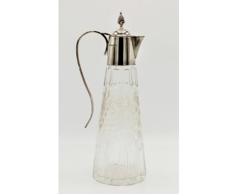 An Elizabeth II silver mounted etched and cut glass claret jug, trumpet form, pineapple finial to domed cover, decorated with