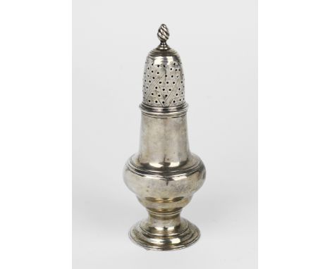 A George III silver baluster pepper caster, Thomas and Jabez Daniell, London 1773, with reeded borders, pierced dome cover wi