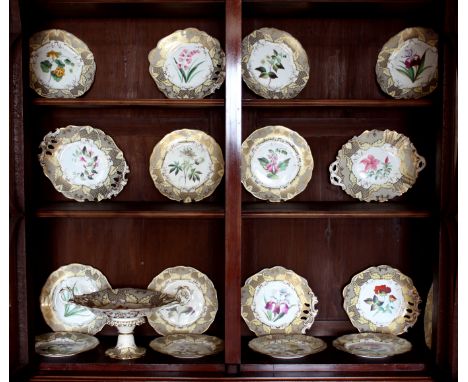 A 19th century English botanical part dessert service, possibly Rockingham, comprising a large tazza with twin foliate strap 