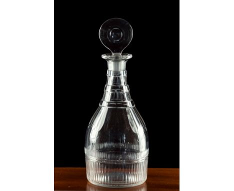 A Georgian cut glass mallet decanter with bullseye stopper, panel cut decoration around base & segmented design to neck, 11½i