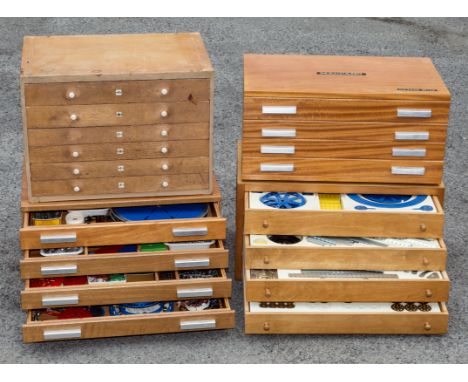 A near complete 1960s Meccano Outfit No.10 in four drawer oak cabinet, drawers opening to reveal fitted plastic compartments,