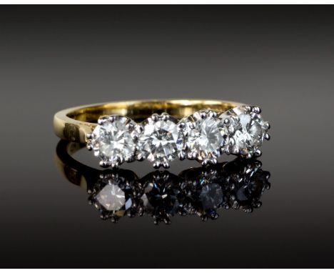 An 18ct yellow gold four stone diamond ring, the four evenly sized brilliant cut diamonds totalling approx. 1.0 carats, ring 