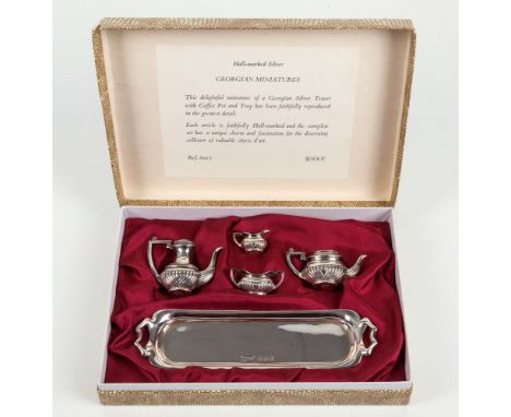 A modern miniature Georgian style silver tea set, David Hollander & Son, Birmingham 1974, comprising coffee pot, teapot, suga