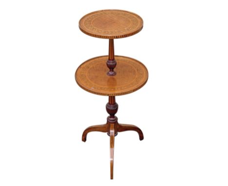 An Edwardian marquetry and mahogany two-tier occasional table, the two graduated circular tiers with husk marquetry borders a