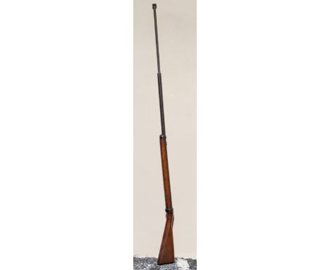 A British Army bayonet training rifle, sprung plunger with button terminal, riding in a steel tube with hardwood stock, lengt