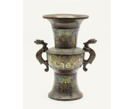 A Chinese "Gu" shaped enamelled bronze vase in the archaic style, 20th century, twin mythical beast/serpent handles, decorate