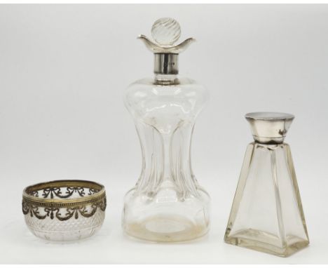 A Victorian silver mounted glass glug-glug decanter, maker's mark rubbed, London 1895, typical form with silver double pourer