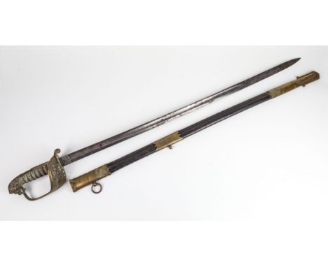 A Royal Navy Officer's sword, the sword features a brass hilt, with embossed Royal Navy insignia, shark-skin grip and brass p