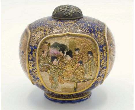 A Japanese Satsuma jar and cover, Meiji period (1868-1912), earthenware, of slightly flattened, globular form, the four field
