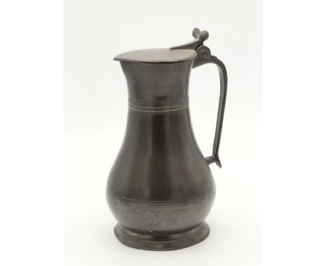 An 18th century Channel Islands pewter measure, quart size, flagon Type 1, maker A. Carter, 'SM', double Carter arms (heavily