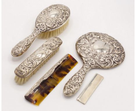 An Elizabeth II silver child's comb, Adie Brothers Ltd., Birmingham 1952, the faux tortoiseshell comb with silver mount and e