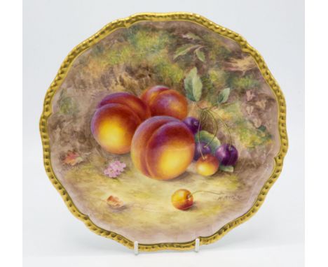 A Royal Worcester hand painted cabinet plate, painted with fruit, serpentine shaped with gadroon border heightened in gilt, s