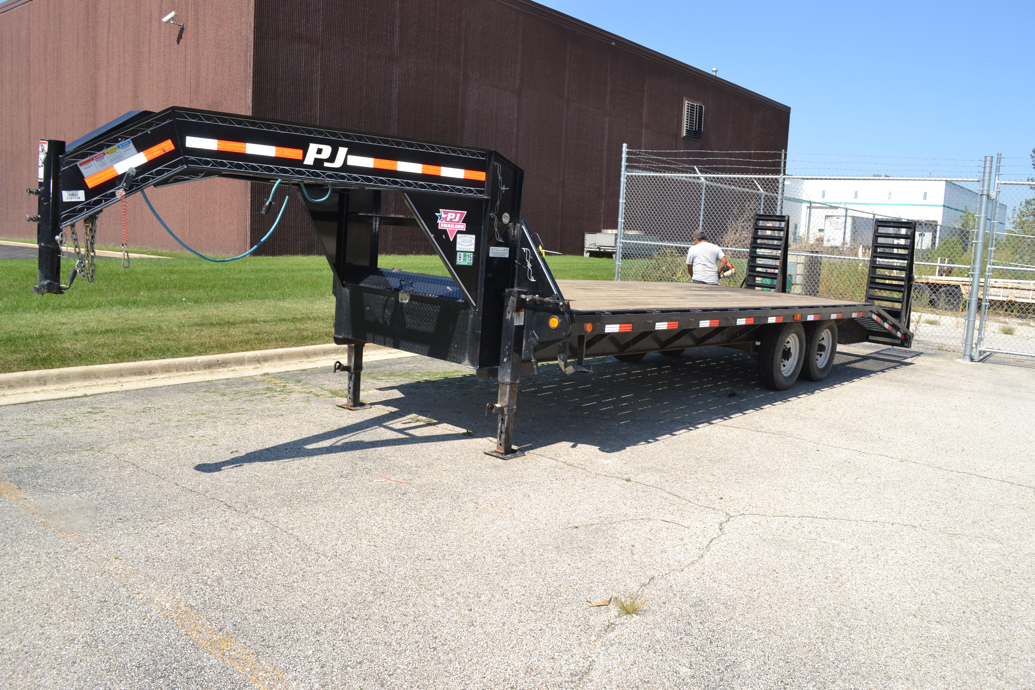 2013 PJ 8 ft. x 18 ft. Wood Deck TandemAxle Gooseneck Flat Bed Trailer