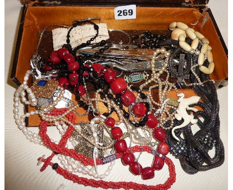 Assorted vintage and antique costume jewellery in case, some silver, red coral beaded necklace, scissors etc.