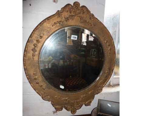 1920's bevel edged round wall mirror in wood and gesso frame