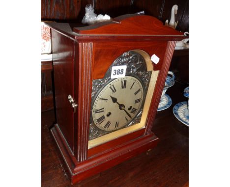 Contemporary mantle clock in wood case
