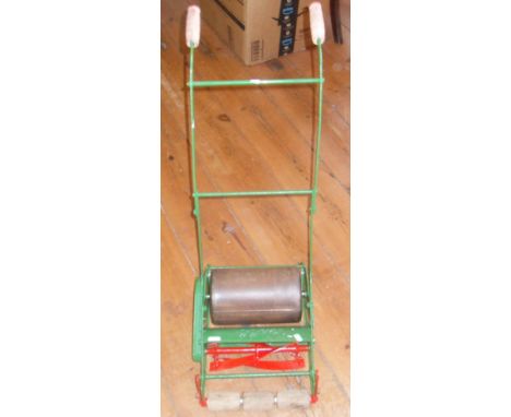 A vintage Webb child's toy lawn mower