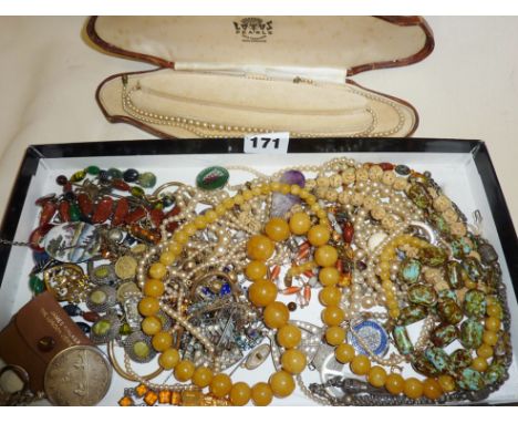 Collection of costume jewellery, badges, vintage faux pearls etc.