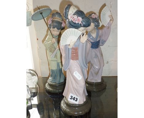 Three Lladro geisha girls