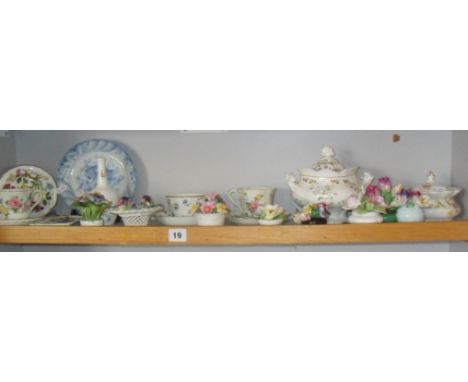 Shelf of assorted floral decorated china and china flower ornaments, etc.