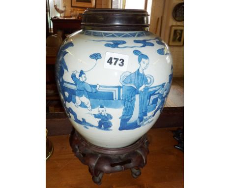 Chinese Kangxi style blue and white jar on carved hardwood stand with similar cover, 34cm tall overall
