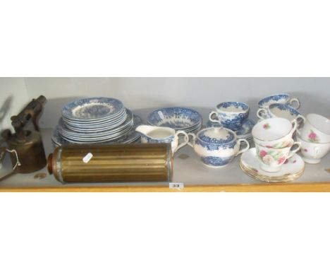 Assorted blue and white tea ware, a blow lamp, and brass muff warmer flask